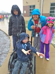 Tarver Elementary School students get some learning time outside this  morning before 50 degree weather melts it all away. What did they learn?  Snow forms when water vapor in the atmosphere freezes