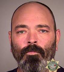 Portland 'Proud Boys' member arrested after allegedly pointing gun at  demonstrators