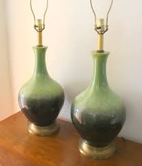 Both stylish and functional this floor lamp with shelves is a revived take on a classic design. Lighting Picked Vintage