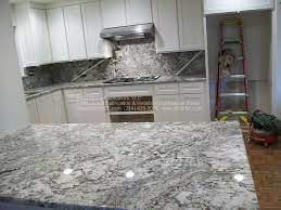 This granite has light gray bands and streaks with patches of dark gray and brown. Granit Counter Tops Bing Images Granite Countertops Bianco Antico Granite Countertops