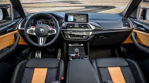 The available panoramic moonroof highlights the interior with natural light. Bmw X3 M Interior Layout Technology Top Gear