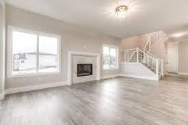 Built By Truman Cornerstone Single Family Spec Home In Calgary Alberta Features Hardwood Floors Whi Interior Design Kitchen Contemporary Home House Flooring