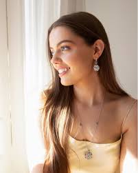 Sarah Farren-Price is a sunlit dream in our new matching earrings and  necklace. A vibrant symphony of purple tanzanite, pink sapphires, green  tsavorite, and diamonds