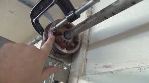 Cables problem can often be resolved while a problem with the operator will likely require a visit from a professional. Why Garage Door Spring Replacement Is Not A Good Diy Task Garage Door Spring Repair Garage Door Cable Broken Garage Door