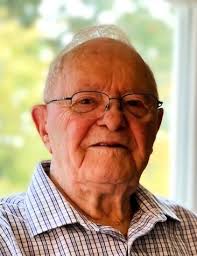 David Warner Obituary