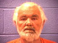 Man charged with taking lewd photos