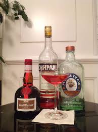 Copper Illusion 4 Cl Gin 2 Cl Grand Marnier Cordon Rouge 2 Cl Campari Stir The Ingredients With Ice In A Mixin Orange Twist Mixing Glass Tito S Vodka Bottle