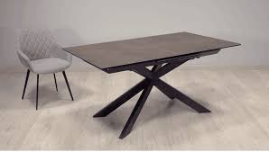 In any other room, this dining table would look average in size, but when you play with proportions in a space, this table looks much smaller. The Slate Grey Extension Dining Table Et 217 Tianjin Kingnod Furniture Co Ltd
