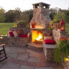 Much like outdoor fireplaces, outdoor gas log sets are similar to their indoor versions. Masonry And Stone Fireplace With Seatwalls And Flagstone And Brick Paving Yelp Backyard Fireplace Backyard Outdoor Patio