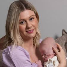 'I saved my premature baby's life with hugs after her twin died in the  womb'