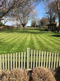 Starting at one end of the concrete, and ensuring the foam goes right up to the edge, roll out the first piece of foam and cut to the required shape. Grass Cutting Woody S Garden Property Services