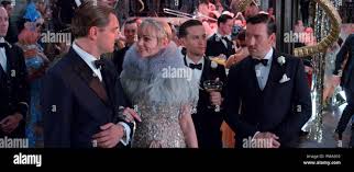 L-r) LEONARDO DiCAPRIO as Jay Gatsby, CAREY MULLIGAN as Daisy Buchanan,  TOBEY MAGUIRE as Nick Carraway and JOEL EDGERTON as Tom Buchanan in Warner  Bros. Pictures' and Village Roadshow Pictures' drama "THE