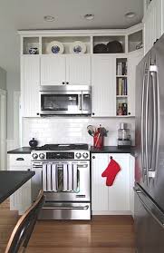 In this friendly kitchen featuring glendale white kitchen cabinets, its lines are complemented by the sheen of a wood floor and the contrasting textures of brick and stone. 29 Best Extending Upper Kitchen Cabinets Ideas Kitchen Cabinets Kitchen Remodel Upper Kitchen Cabinets