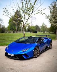 Lamborghini Huracan Performante Black And Blue Lamborghini Huracan Performante Spyder Painted In Blu Vathys W Tricolore Stripes Along The Doors And Futuristic Cars Lamborghini Cars Sports Cars Lamborghini