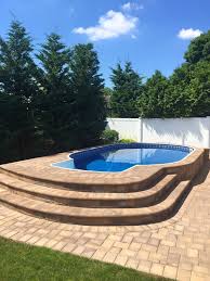 I understand that the steps must be put on concrete to keep them from moving. Radiant 12x20 Semi Inground Oval With Walk In Steps Backyard Pool Landscaping Oval Pool Backyard