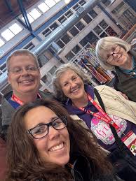 Meet Maria. She just stopped by the rummage sale for the fight against  breast cancer for some yarn. For years she has made mittens to give out to  the children of Denali