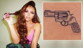 Jesy nelson recently got a new tattoo of a gun credit: Jesy Nelson Branded Bad Influence As She Shows Off New Gun Tattoo