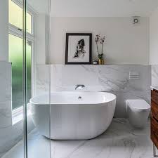 Large transitional master bathroom in melbourne with shaker cabinets, white cabinets, a freestanding tub, a curbless shower, gray tile, an undermount sink, grey floor, a hinged shower door, grey benchtops, a double vanity and a floating vanity. Dinkee Bath Bc Designs Luxury Designer Bathrooms