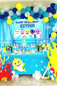 Treat Your Guests To An Underwater Extravaganza With A Fun Baby Shark Dessert Table Li Baby Boy 1st Birthday Party Shark Party Decorations Shark Birthday Party