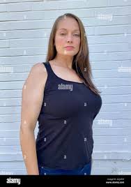 attractive, bbw, beautiful, beauty, big, body positive, brunette, busty,  clothing, confidence, curve, curvy, fashion, female, figure hugging, fitted  Stock Photo - Alamy