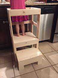 It can be folded and has a handle making it easier to carry. Natural Pine Children S Kitchen Play Safety Helper Step Stool Counter High Sliding Step For Ez Storage Childrens Kitchens Step Stool Kids Kitchen Stool For Kids