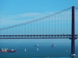 It connects lisbon to southern portugal and spain, and was named after portugal's famous explorer on the 500th anniversary of his voyage to india, which opened maritime. Hd Wallpaper Ponte 25 De Abril Bridge Lisbon Bridge Of 25 April Tejo Wallpaper Flare