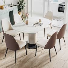 Or are you more fixated on a round table set that's perfect for a traditional home? Modern Leaf Extendable Stone Dining Table Carbon Steel Base Dining Table Modern Round Dining Room Stone Dining Table