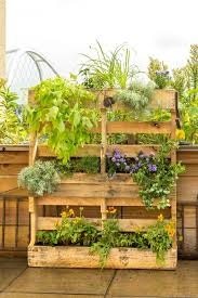 It is gorgeous and would certainly give you additional growing space. Building With Secondhand Stuff Make A Wood Pallet Planter Garden Therapy