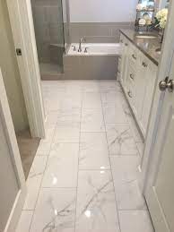 Grey tile on the wall and victorian tile on the floor can be a perfect combination, even though you have a small bathroom. Awesome 30 Marble Tile Bathroom Flooring Ideas Bathroom Tile Designs Marble Tile Bathroom Bathroom Remodel Master
