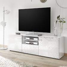 Ce meuble design est un meuble de rangement très pratique avec ses 2 grandes portes et son étagère soit 2 un meuble tv laqué blanc équipé d un système led intégré. Meuble Tv 180 Cm Meuble Tv Avec Led Meuble Tele Blanc Laque
