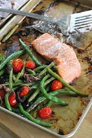Jamie Oliver S Tray Baked Salmon With Veggies Whole Salmon Recipe Baked Salmon Salmon Recipes