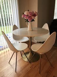Gold And Marble Leilani Tulip Dining Table World Market In 2020 Tulip Dining Table Round Dining Room Table Round Dining Table Sets