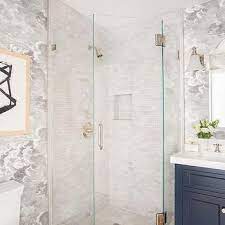 This bathroom features honed carrara marble tile around the shower walls and curb, as well as along the lower walls surrounding the freestanding tub. Pin On Beautiful Bathroom Small And Spa