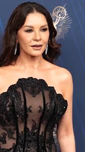 Catherine Zeta-Jones in a sheer black strapless gown at last night's Emmy  awards.