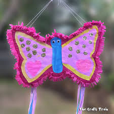 Take one half and fold it again two times to make a square. Diy Butterfly Pinata The Craft Train