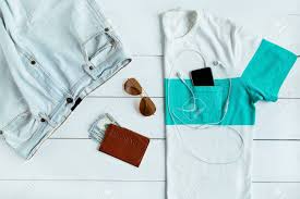 Check spelling or type a new query. Set Of Men S Tourist Summer Clothing With Passport Money Sunglasses And Smart Phone With Headphones On White Wooden Background Stock Photo Picture And Royalty Free Image Image 128520235