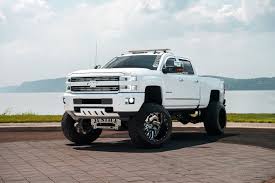 White Chevy Silverado on Fuel Offroad Wheels Gets a Great Lift Kit |  CARiD.com Gallery