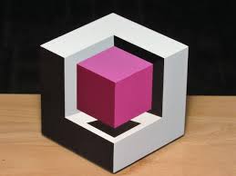 It is the second using an ingenious cubic external frame with interior pieces that appear to form a complete cube within the frame. See The Cube Crimson Inner 3 X 3 X 3 Cube