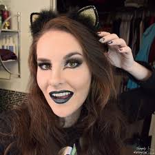 How to get this face and be a really unpredictable cat for holoween:  http://bit.ly/BlackHoloLips