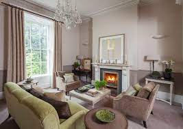 When arranging your living room furniture, start with the largest piece first. 13 Strategies For Making A Large Room Feel Comfortable
