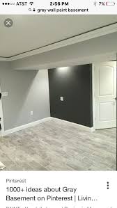 Black And Blue Burlington Ma Basement Grey Floors Grey Walls Maybe Blue Or Black Sofa With Accent Colors Maybe Purple For Raven Grey Flooring Small Basement Remodel Finishing Basement