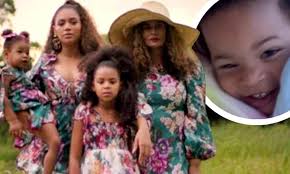 Beyonce revealed her growing baby bump at the grammy awards on sunday, blowing fans away with her pregnancy glow. Beyonce Offers Rare Glimpse Of Twins Sir And Rumi Three In Visual Album Black Is King Daily Mail Online