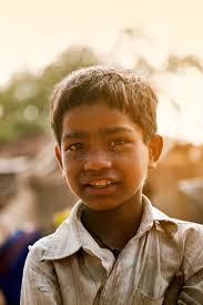 Young Boy Works Hard As Porter, India Editorial Stock Image