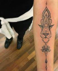 Lion Tattoo Meaning Lion Tattoo Ideas For Men And Women With Photos Best Places For Tattoos That Won T Stretch Bes Tattoos Sleeve Tattoos Tattoos For Guys