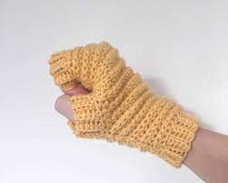 Ch 34, dc in third ch from hook, dc in each ch across: Might Mitts Crochet Fingerless Gloves Dora Does