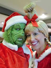 Michigan couple dress as Grinch, Cindy Lou Who to deliver kids presents