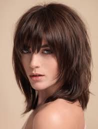 The hairstyle barely touches the shoulders and can be parted to the side or in the middle. 50 Medium Shag Haircuts Hairstyles Update