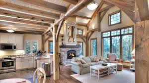 Successful Lighting Design In A Timber Home With Cathedral And Vaulted Ceilings Soaring 20 Plus Feet Into The A Timber House Timber Frame Homes Vaulted Ceiling