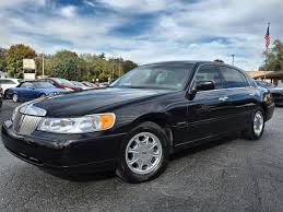 Image result for Charcoal Green 1999 Town Car