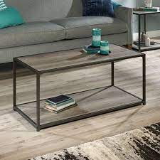 The table is made from composite wood. Mainstays Metro Coffee Table Grey Oak Walmart Com Coffee Table Oak Coffee Table Coffee Table Grey